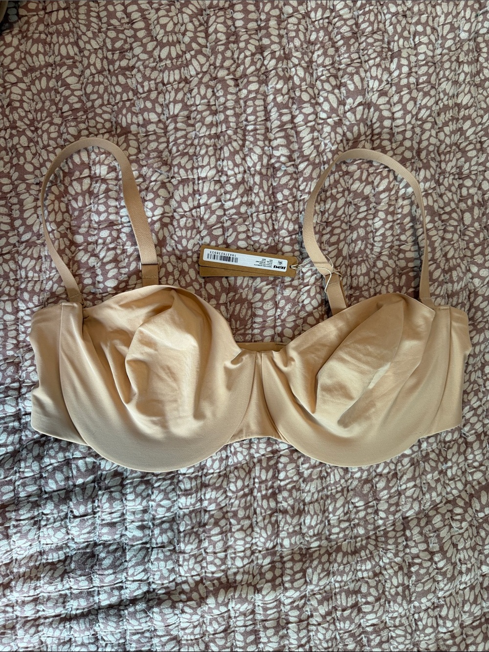 SKIMS Smoothing Intimates Unlined Strapless Bra in Clay